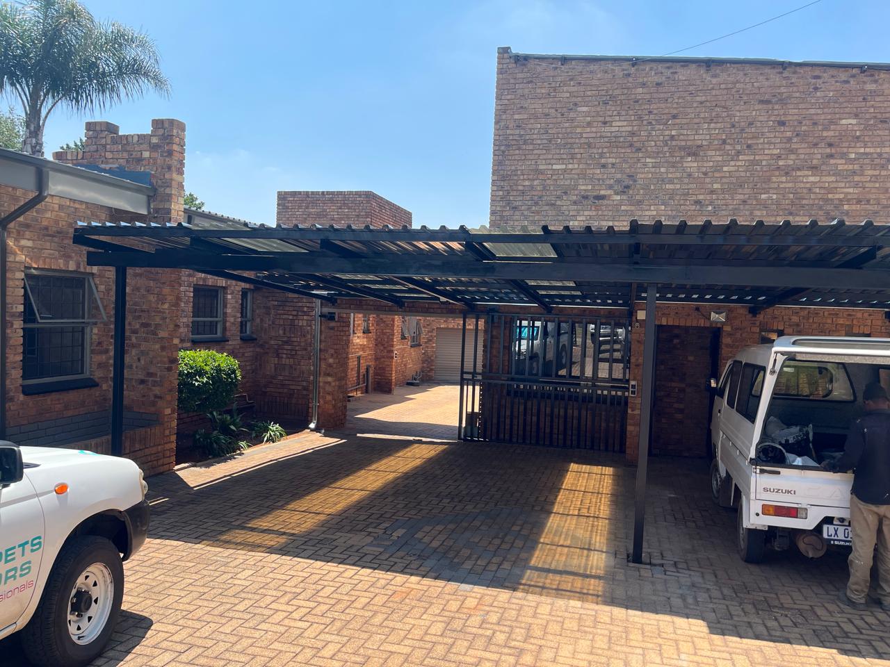 Steel carport structure by WB Projects